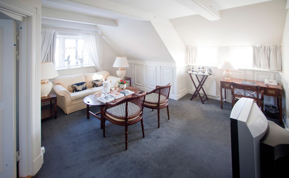 Suite, 1 Bedroom | Desk, iron/ironing board, free WiFi, bed sheets