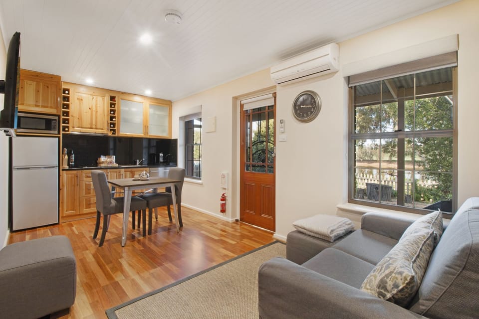 Superior Suite, 1 Bedroom, Lake View | Private kitchen | Full-size fridge, microwave, stovetop, dishwasher