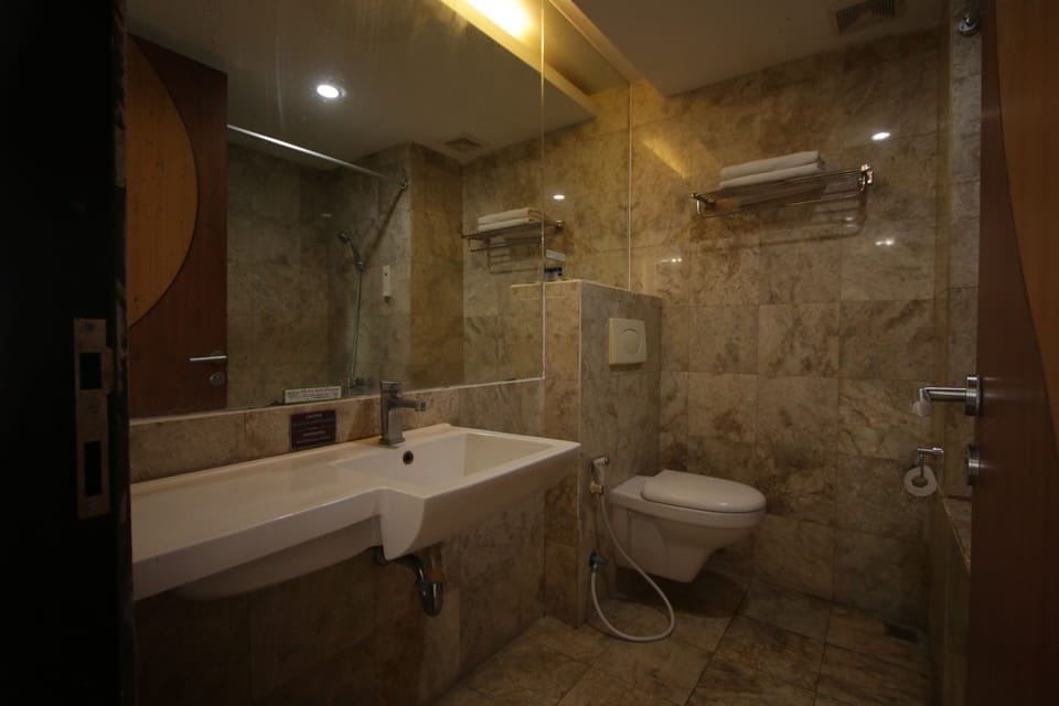 Shower, free toiletries, hair dryer, towels