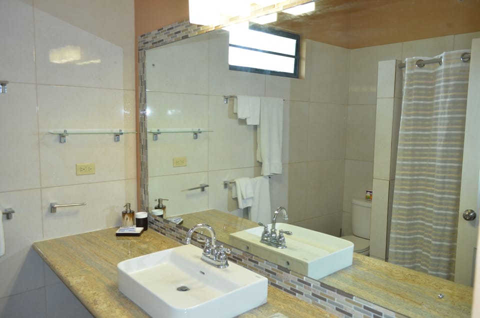 Superior Room, Ensuite | Bathroom | Towels, soap, toilet paper