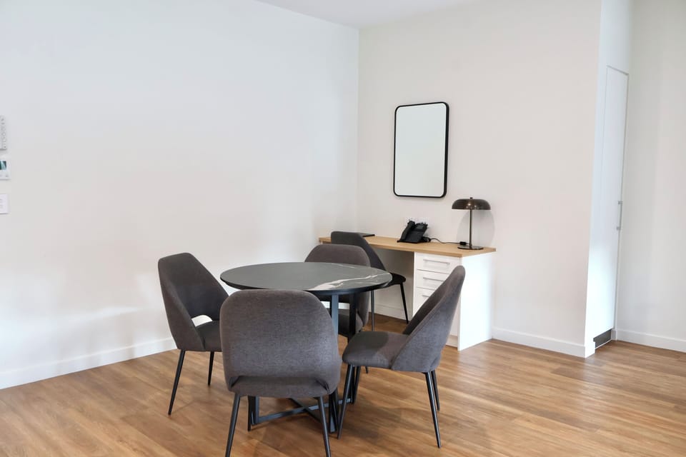 Executive 1 Bedroom Apartment | Living area | 32-inch LCD TV with digital channels, streaming services