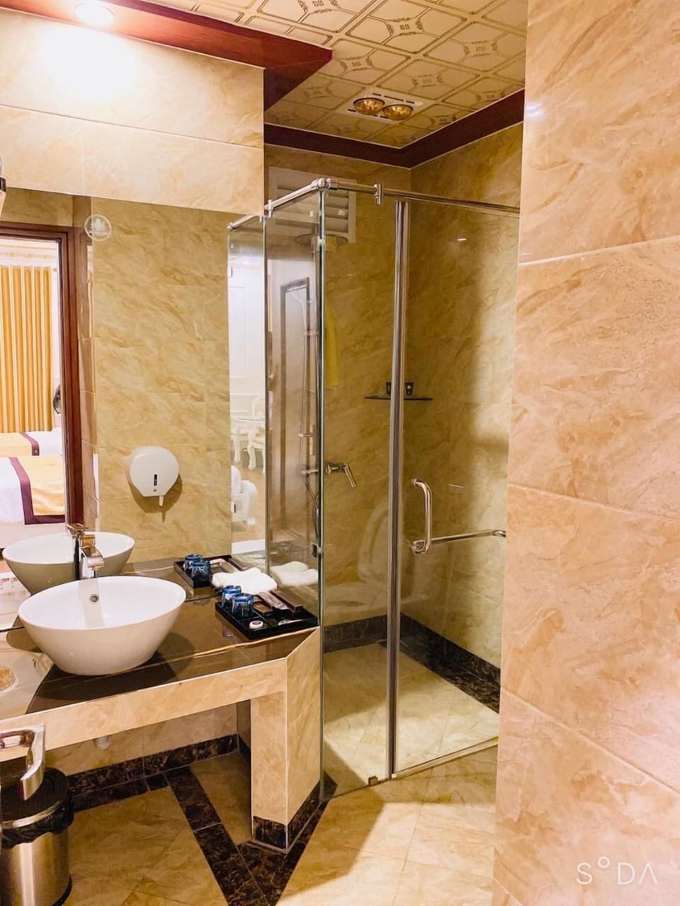 Shower, free toiletries, hair dryer, slippers