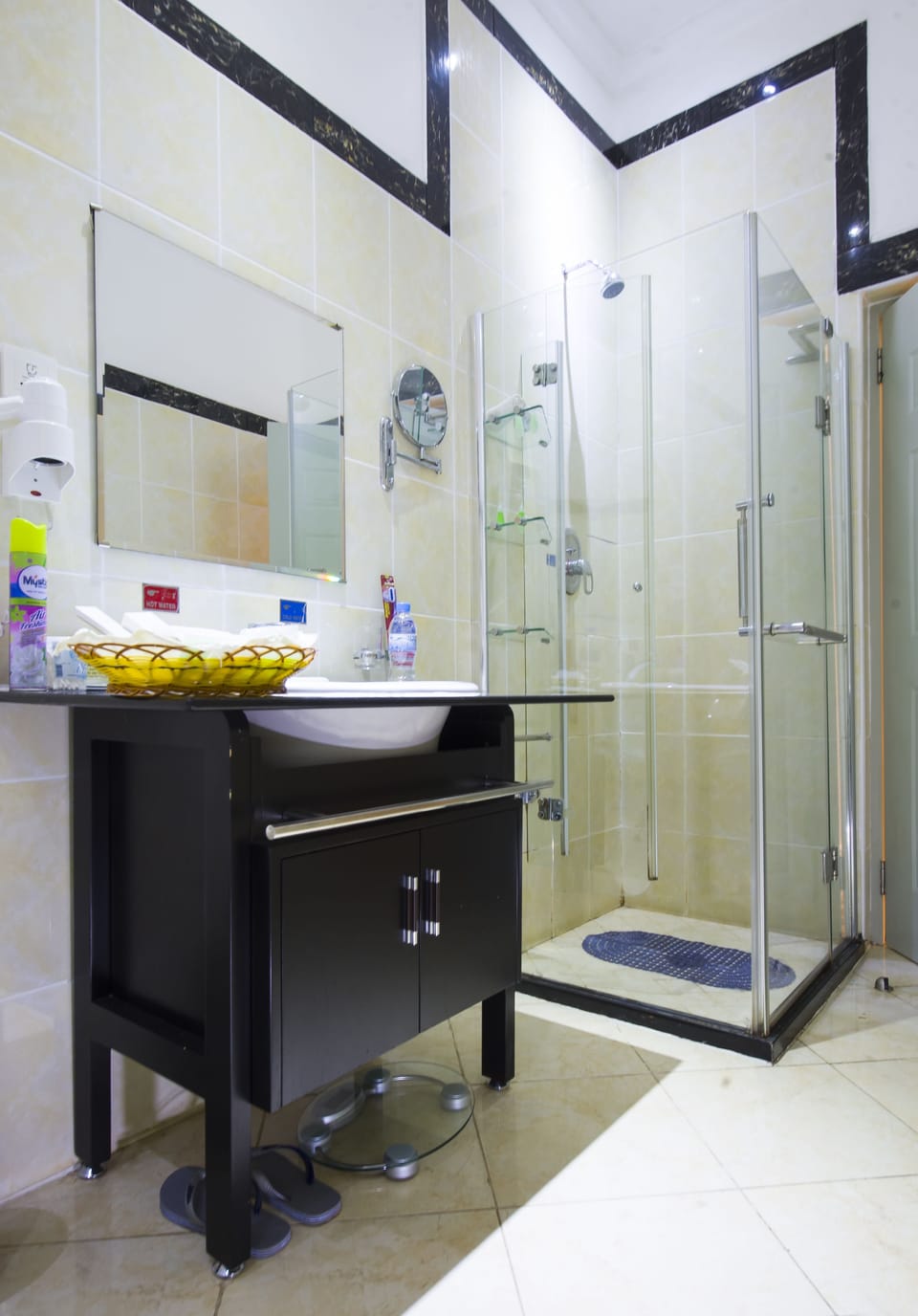Separate tub and shower, rainfall showerhead, designer toiletries