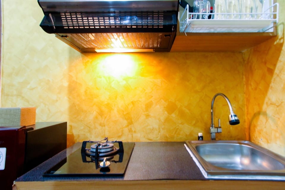 Standard Room | Private kitchen | Fridge, stovetop, electric kettle, rice cooker