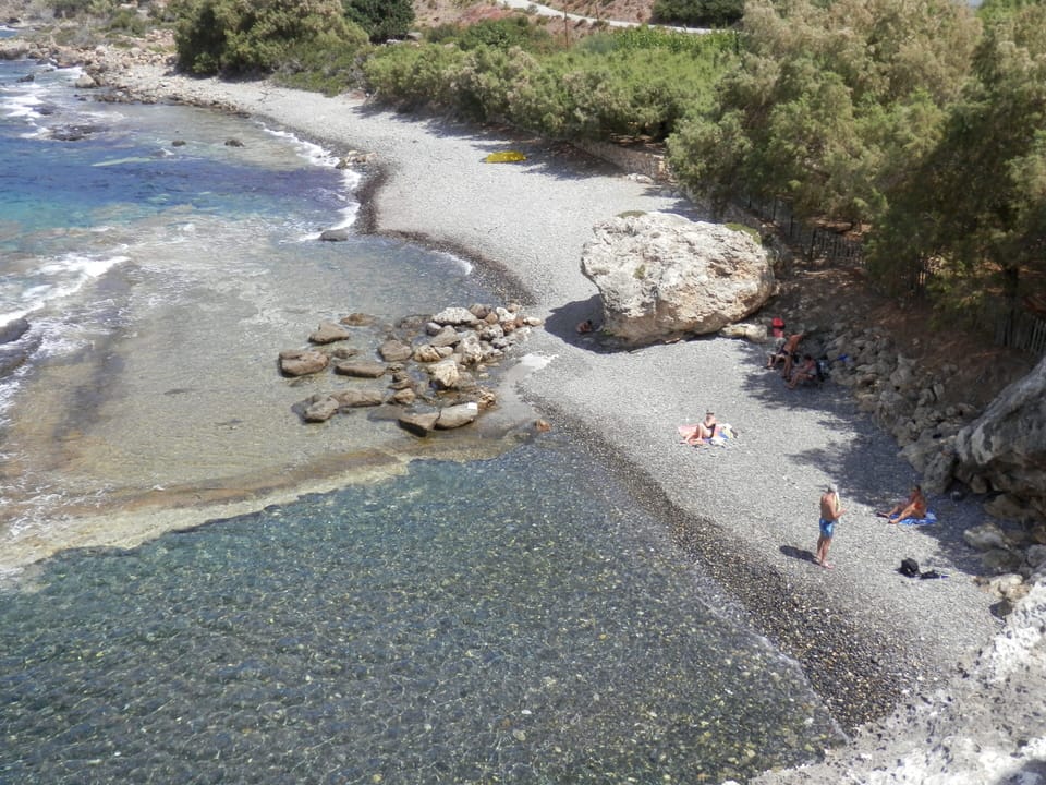 On the beach, black sand