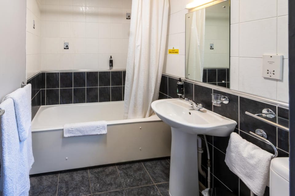 Hair dryer, towels, soap, toilet paper