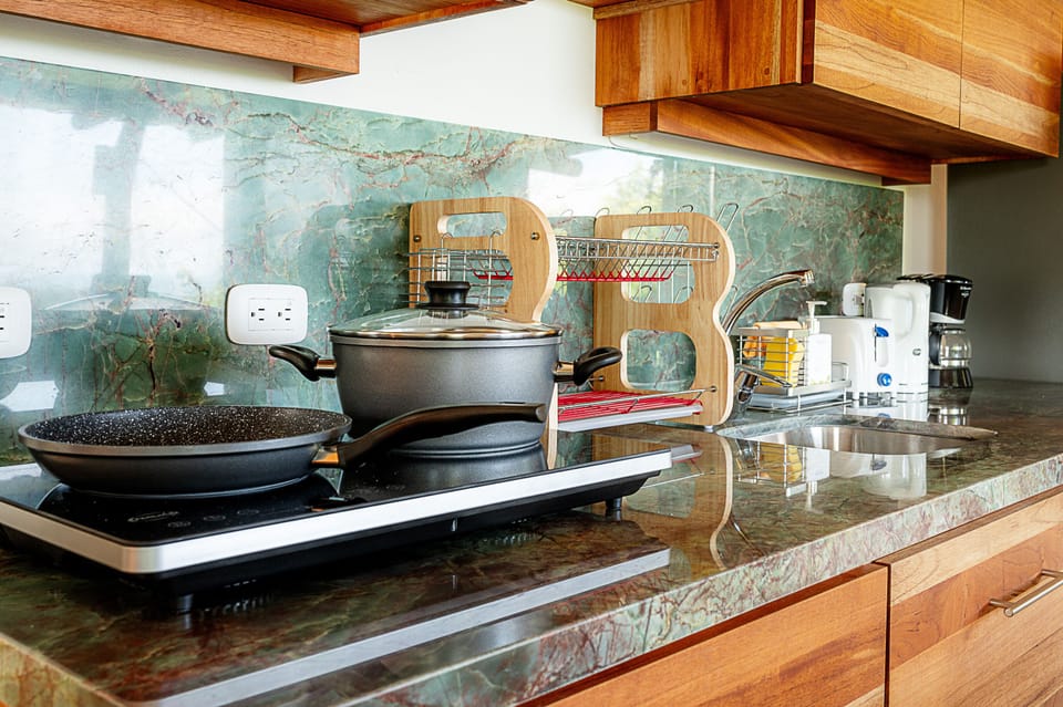 Exclusive Condo, 2 Bedrooms, Non Smoking, Ocean View | Private kitchen | Fridge, highchair
