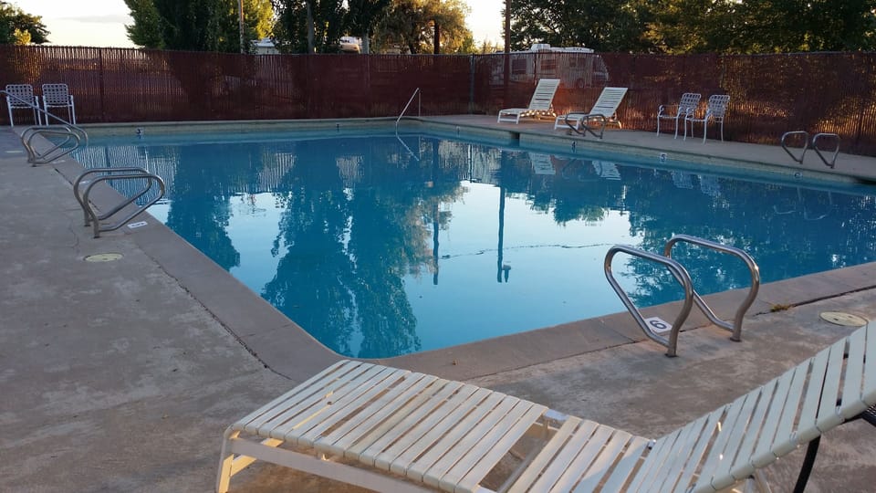 Seasonal outdoor pool, open 11:00 AM to 8:00 PM, sun loungers