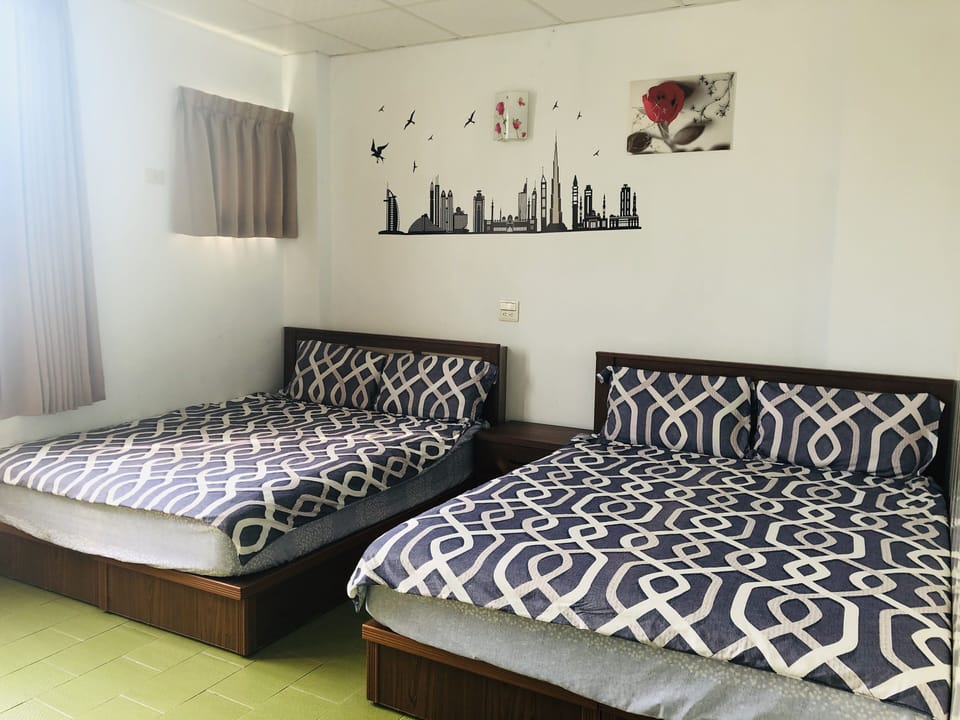 Standard Quadruple Room | Desk, blackout drapes, free WiFi, bed sheets