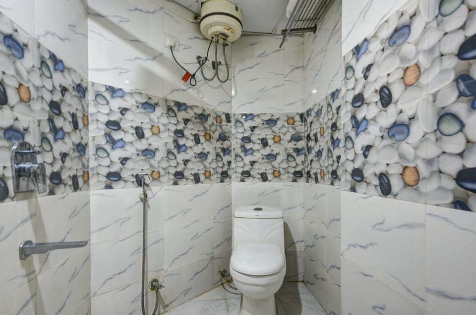Shower, rainfall showerhead, designer toiletries, hair dryer