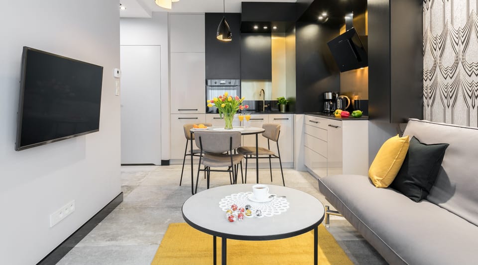 Deluxe Studio Suite, 1 Double Bed with Sofa bed, Balcony (Rakowicka 15A st.) | Living area | 42-inch flat-screen TV with cable channels, TV