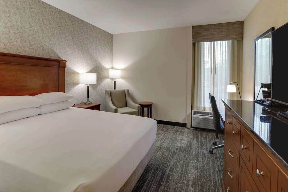 Room, 1 Queen Bed | Desk, laptop workspace, blackout drapes, iron/ironing board