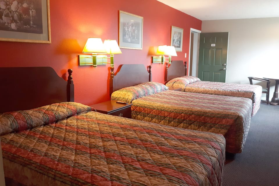 Individually furnished, desk, laptop workspace, iron/ironing board