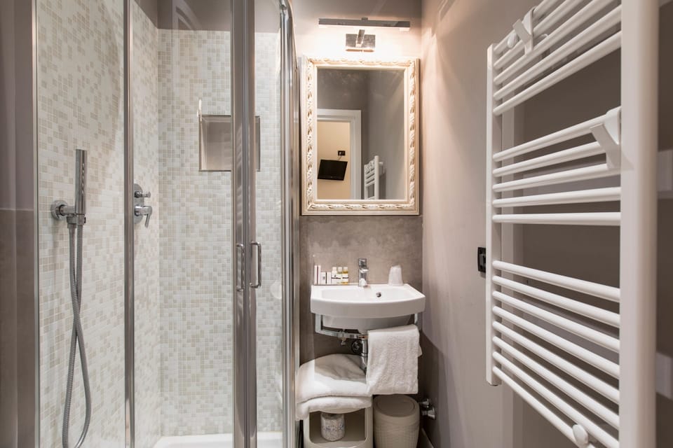 Shower, free toiletries, hair dryer, electronic bidet