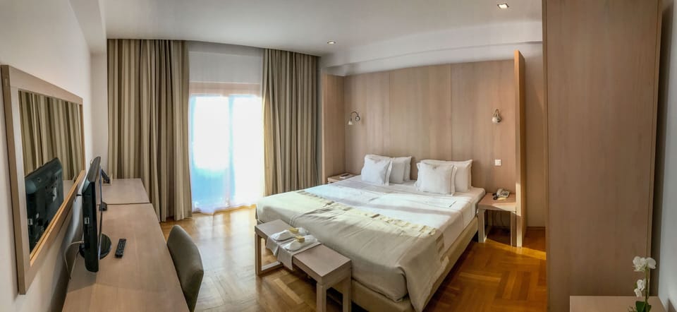 Family Room | Hypo-allergenic bedding available, minibar, in-room safe, desk