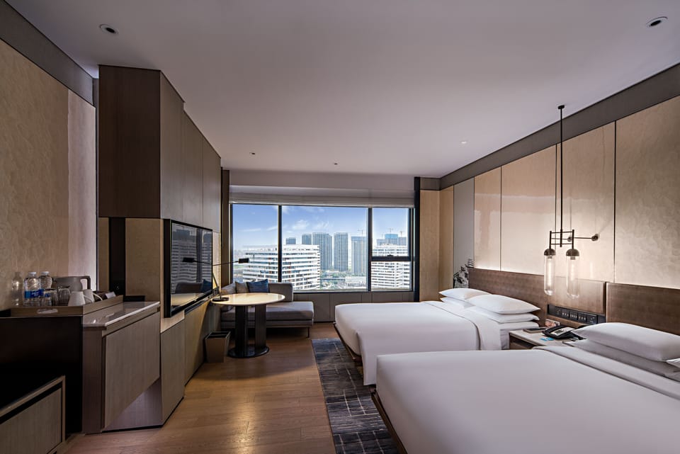 Premium bedding, down comforters, minibar, in-room safe