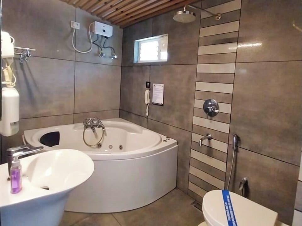 Luxury Studio Suite, Mountain View | Bathroom | Shower, rainfall showerhead, slippers, toilet paper