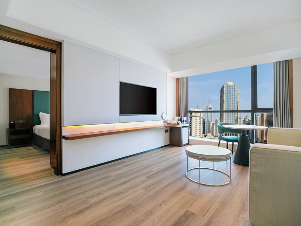 Suite, 1 King Bed, Club Lounge Access | Minibar, in-room safe, desk, blackout drapes