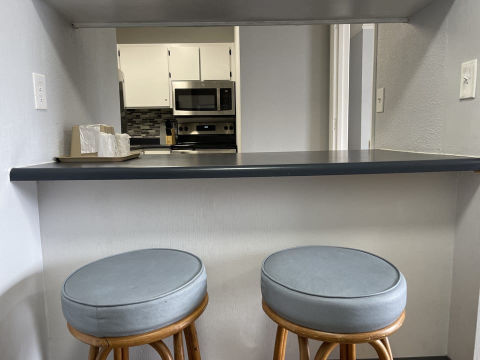 Deluxe Room, 1 Queen Bed, Kitchenette | Private kitchen | Fridge, coffee/tea maker