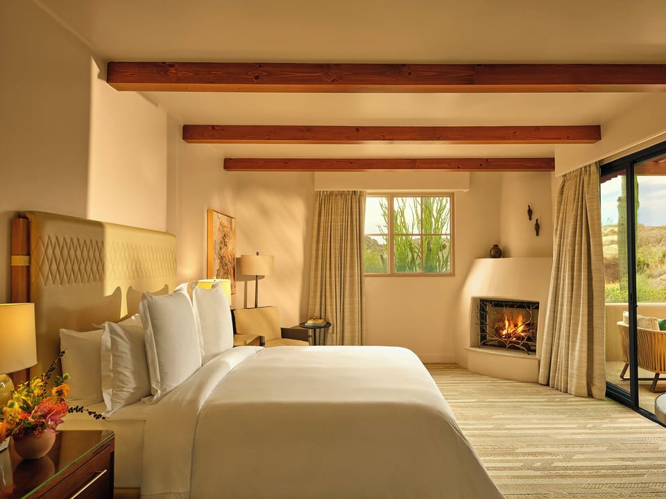 Premium bedding, down comforters, minibar, in-room safe