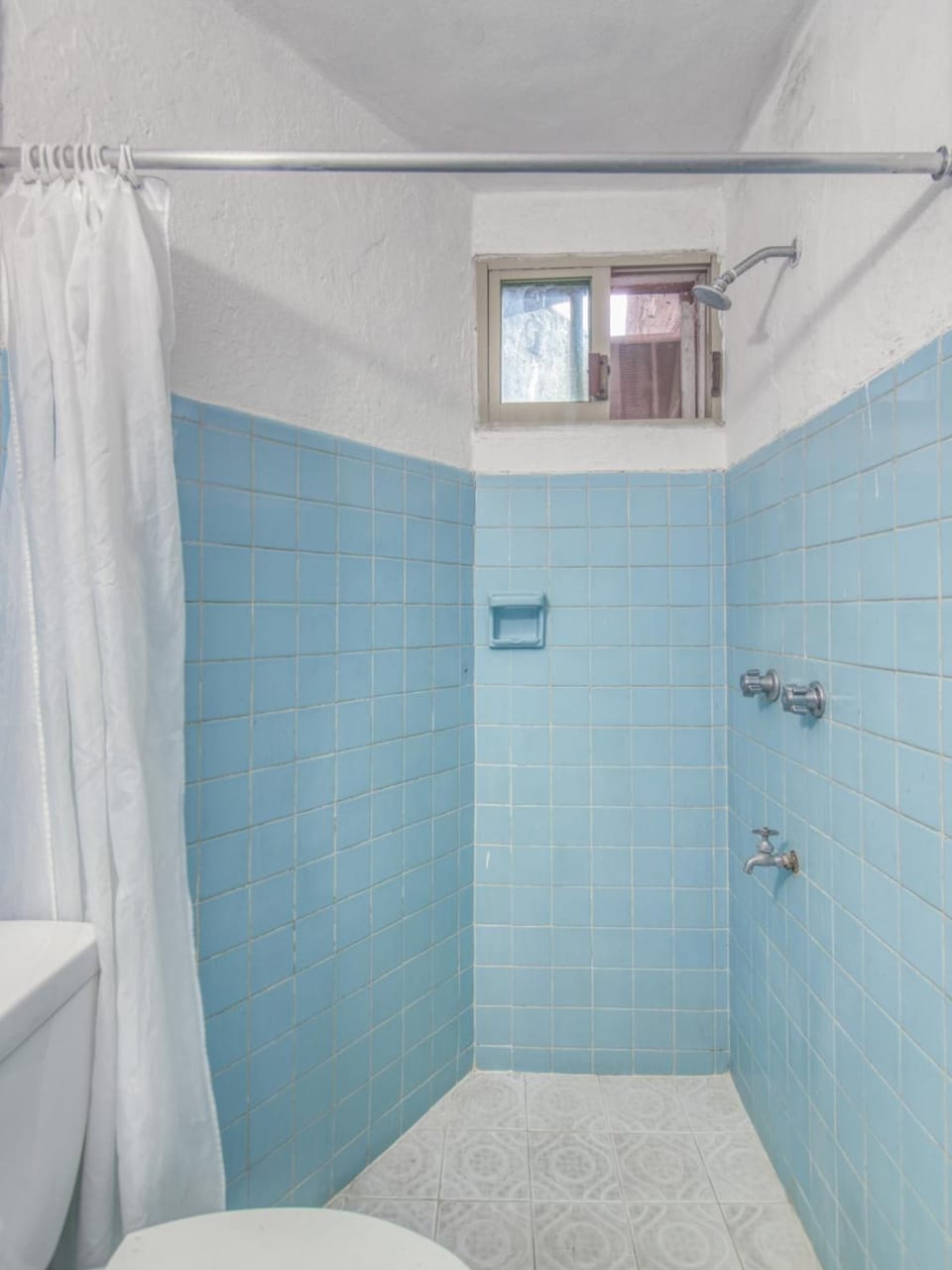 Shower, towels, soap, shampoo