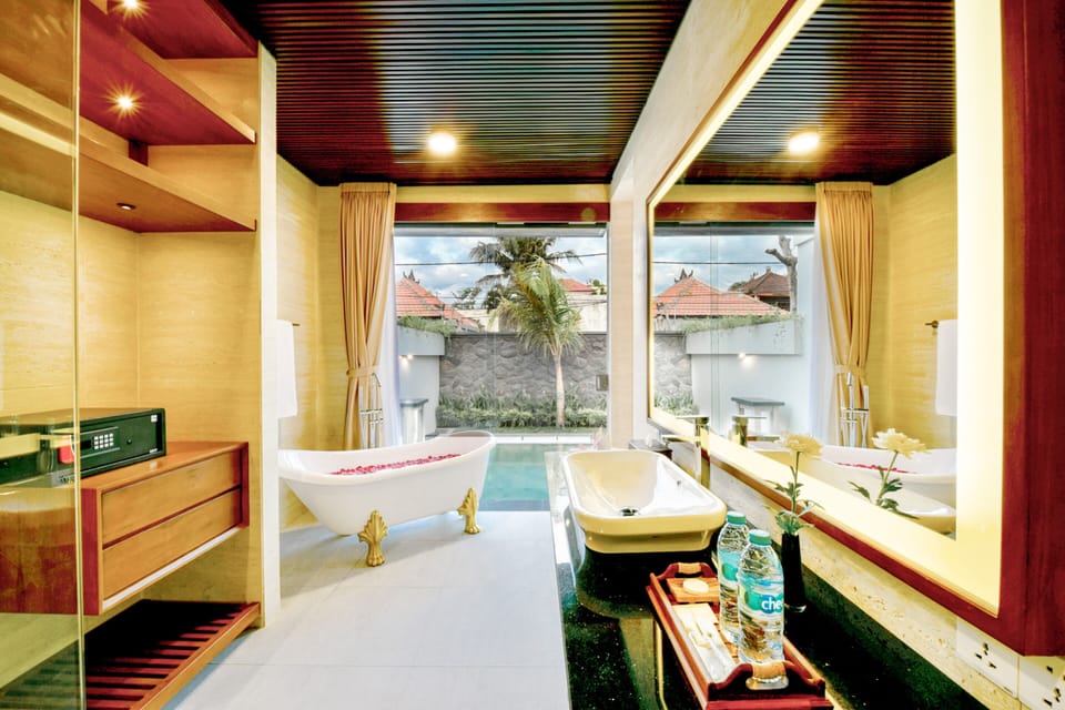 Combined shower/tub, free toiletries, hair dryer, slippers