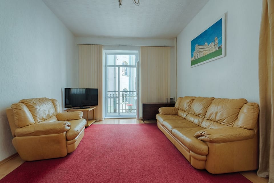 Apartment, 2 Bedrooms | Living room | 100-cm TV with digital channels
