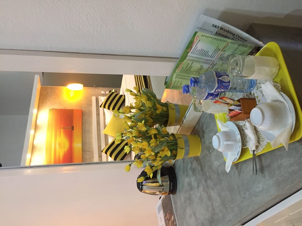 Deluxe Room, Garden View | Coffee and/or coffee maker