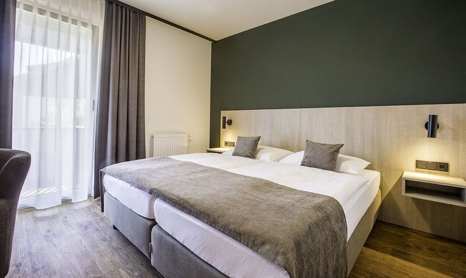 Double or Twin Room | Hypo-allergenic bedding, minibar, in-room safe, desk
