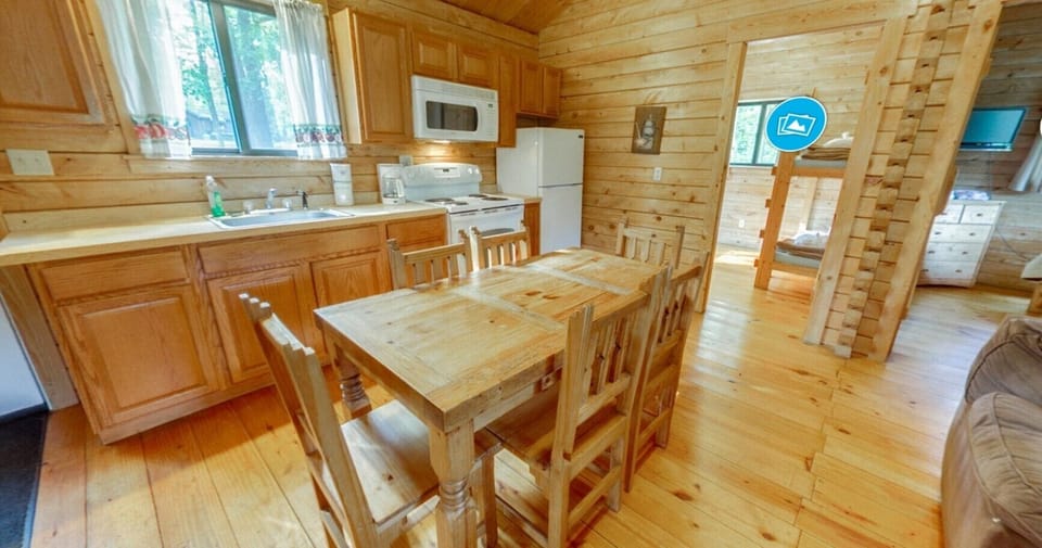 Deluxe Cottage, Kitchenette | Private kitchen | Fridge, microwave, stovetop, coffee/tea maker