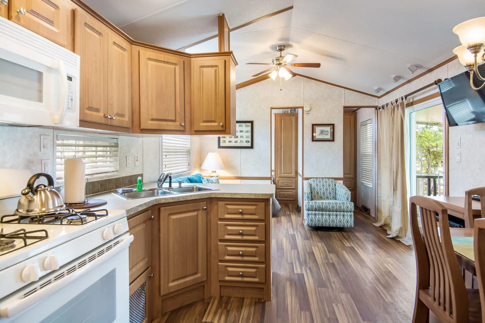Fridge, cookware/dishes/utensils, dining tables