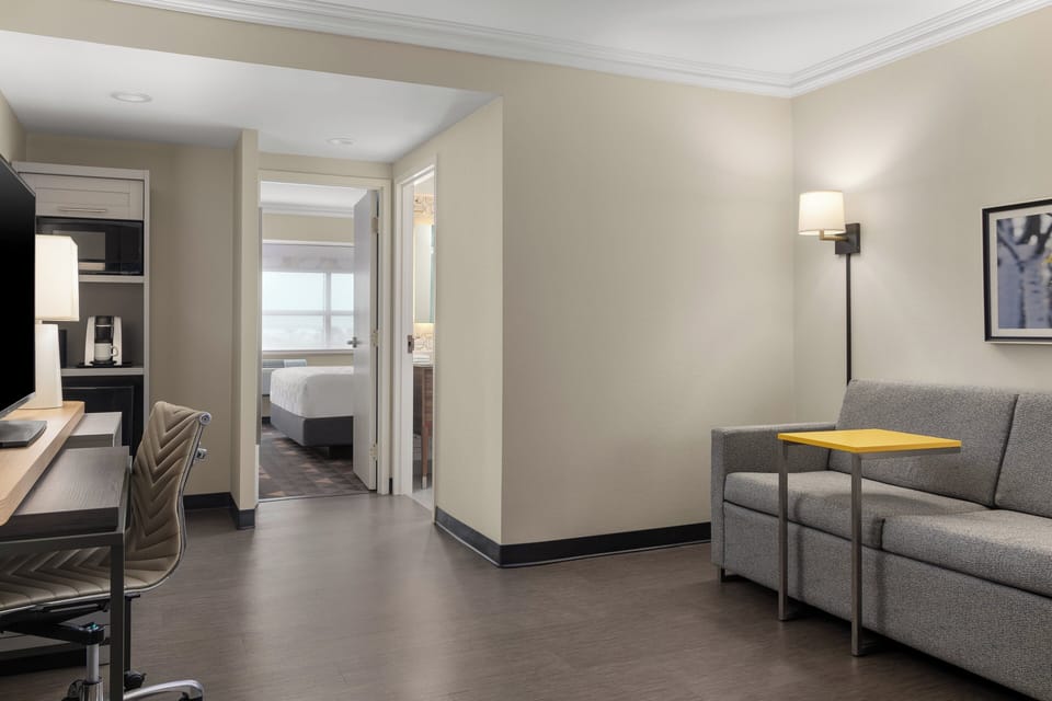 Suite, 1 King Bed | Desk, blackout drapes, soundproofing, iron/ironing board