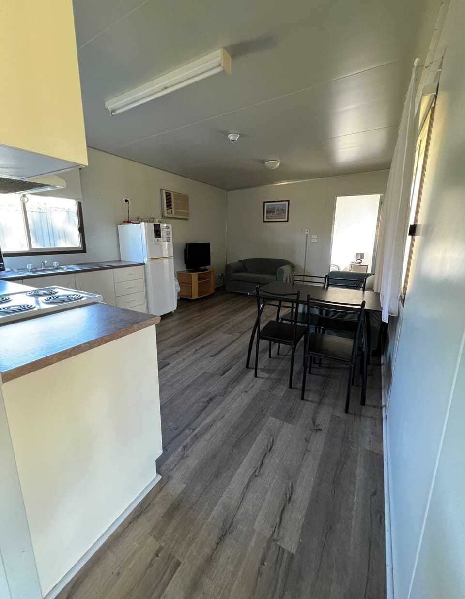 Deluxe House, 2 Bedrooms, Pets Not Allowed | Living area | Flat-screen TV, DVD player