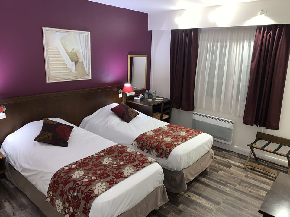 Standard Room, 2 Twin Beds | 2 bedrooms, individually decorated, individually furnished, desk