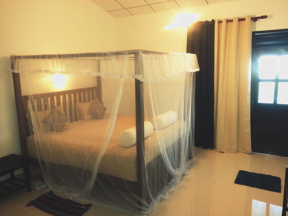 Deluxe Quadruple Room, Sea View | Desk, laptop workspace, soundproofing, free WiFi