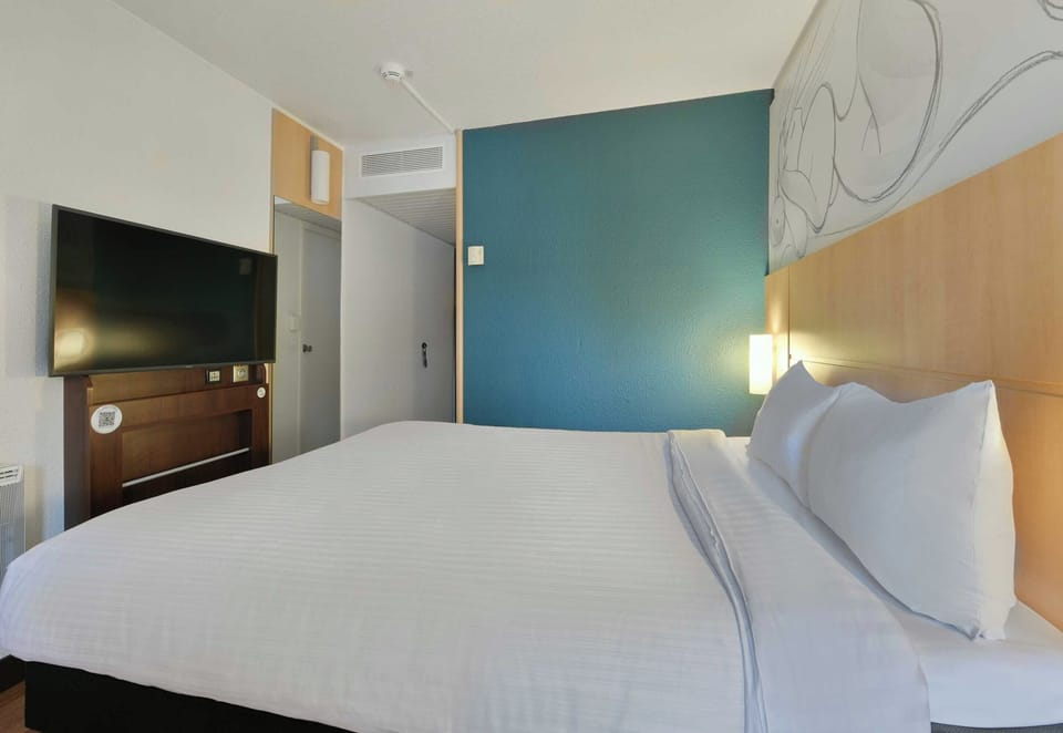 Desk, laptop workspace, blackout drapes, soundproofing