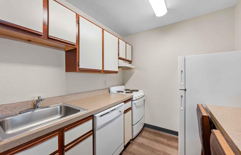 Fridge, microwave, stovetop, cookware/dishes/utensils