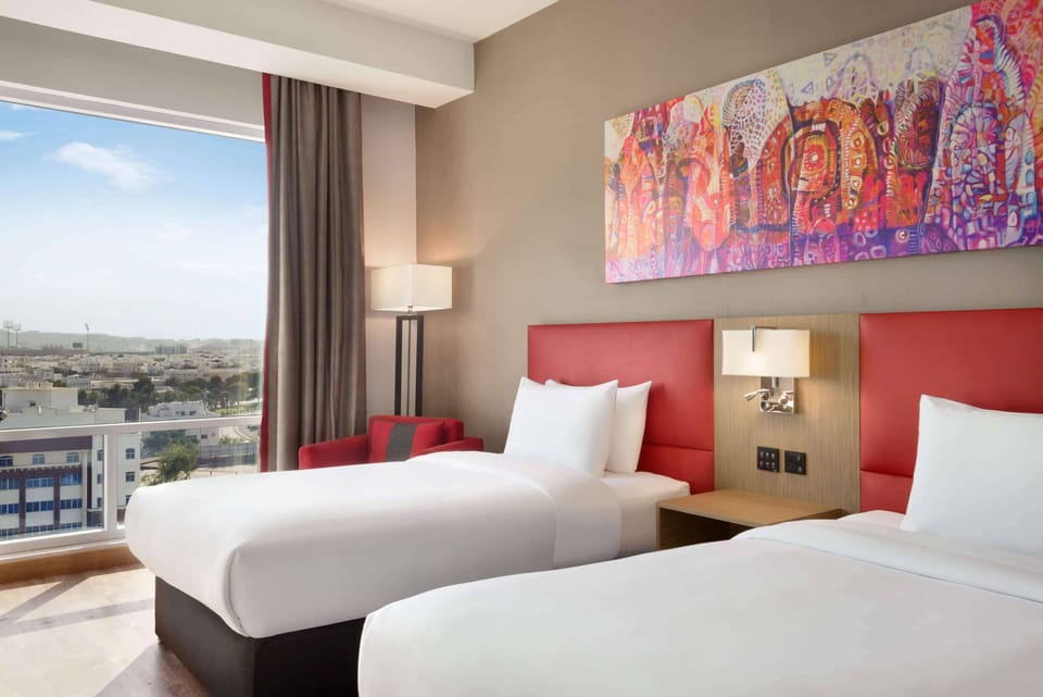 Deluxe Room, 2 Single Beds | Minibar, in-room safe, desk, blackout drapes