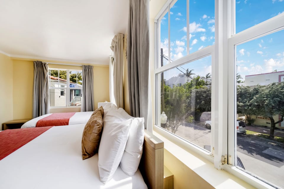 Deluxe Room, Multiple Beds, Private Bathroom | Egyptian cotton sheets, premium bedding, down comforters, pillowtop beds