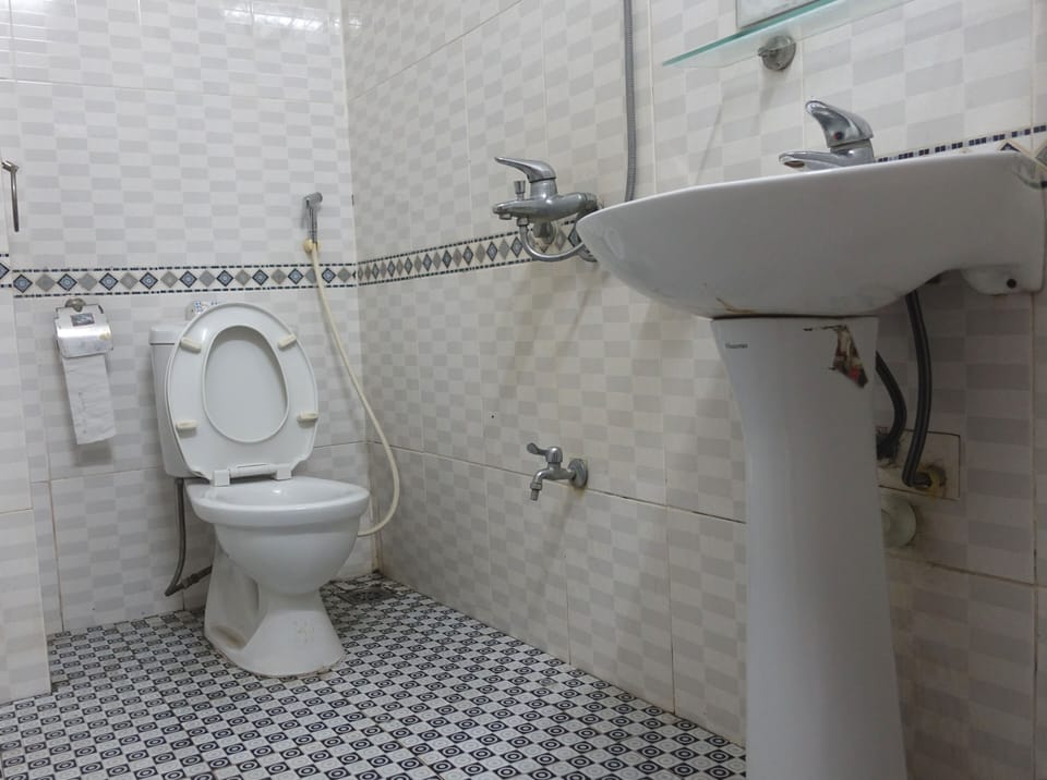 Standard Room | Bathroom | Shower, slippers, towels, soap