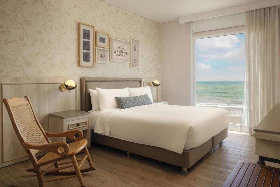 Premium Room, 1 King Bed, Ocean View | Hypo-allergenic bedding available, minibar, in-room safe, desk