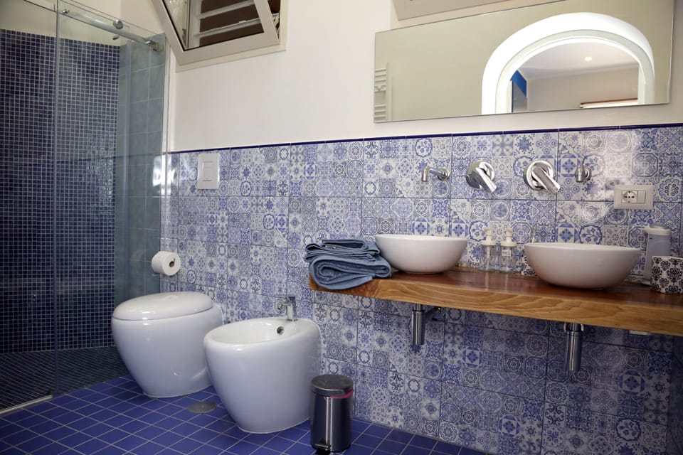 Studio, Balcony, Sea View | Bathroom | Shower, rainfall showerhead, towels