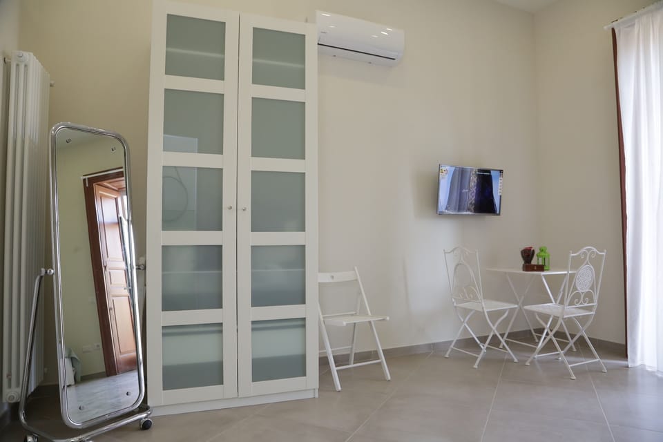 Standard Triple Room, Sea View | Room amenity