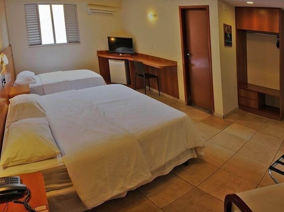 Luxury Room | Minibar, in-room safe, desk, iron/ironing board