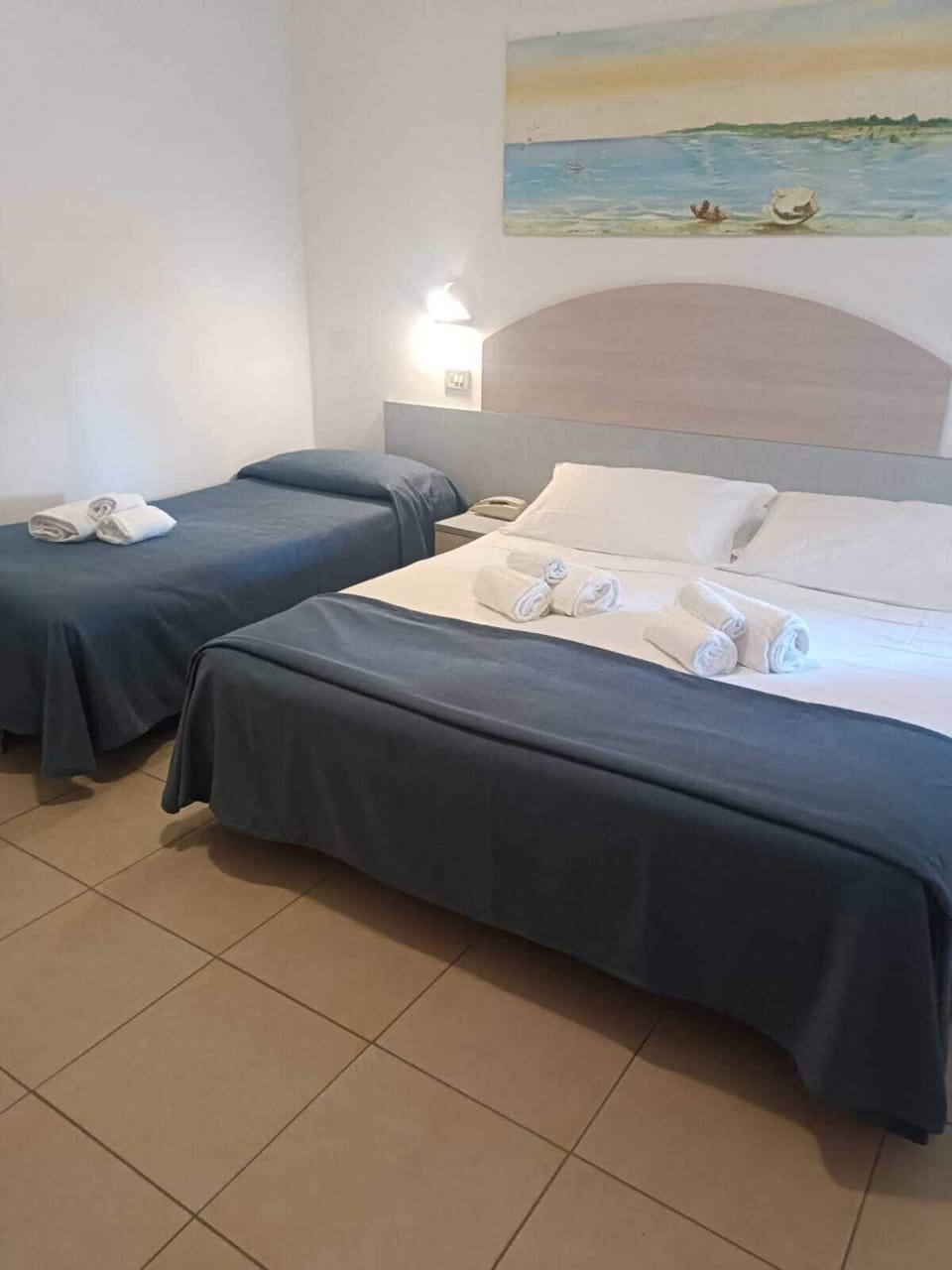 Classic Triple Room | Minibar, in-room safe, desk, laptop workspace