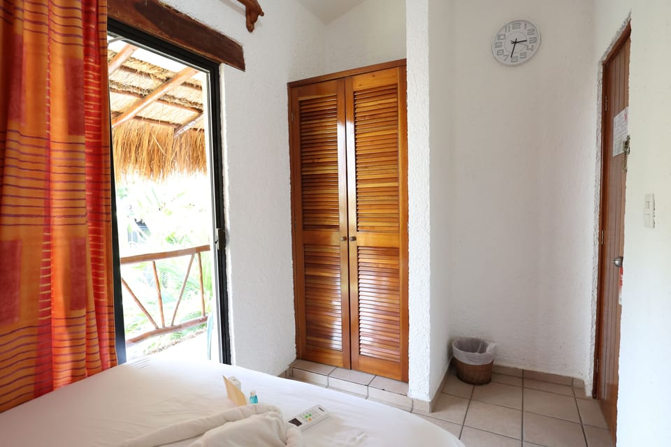 Caribbean Room with Terrace shared bathroom | In-room safe, free WiFi, bed sheets