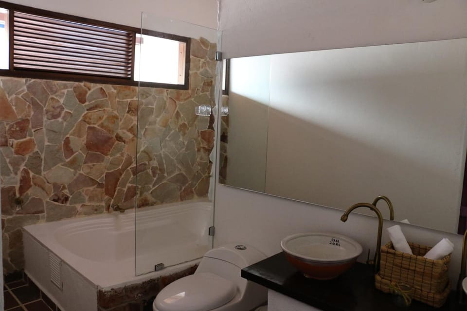 Combined shower/tub, towels, soap, toilet paper