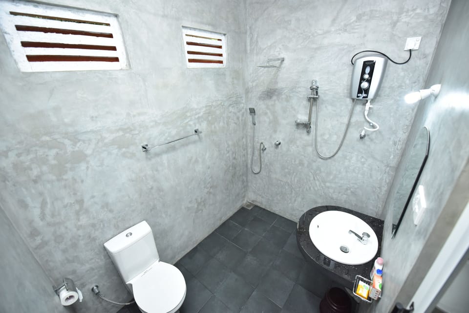 Shower, rainfall showerhead, towels