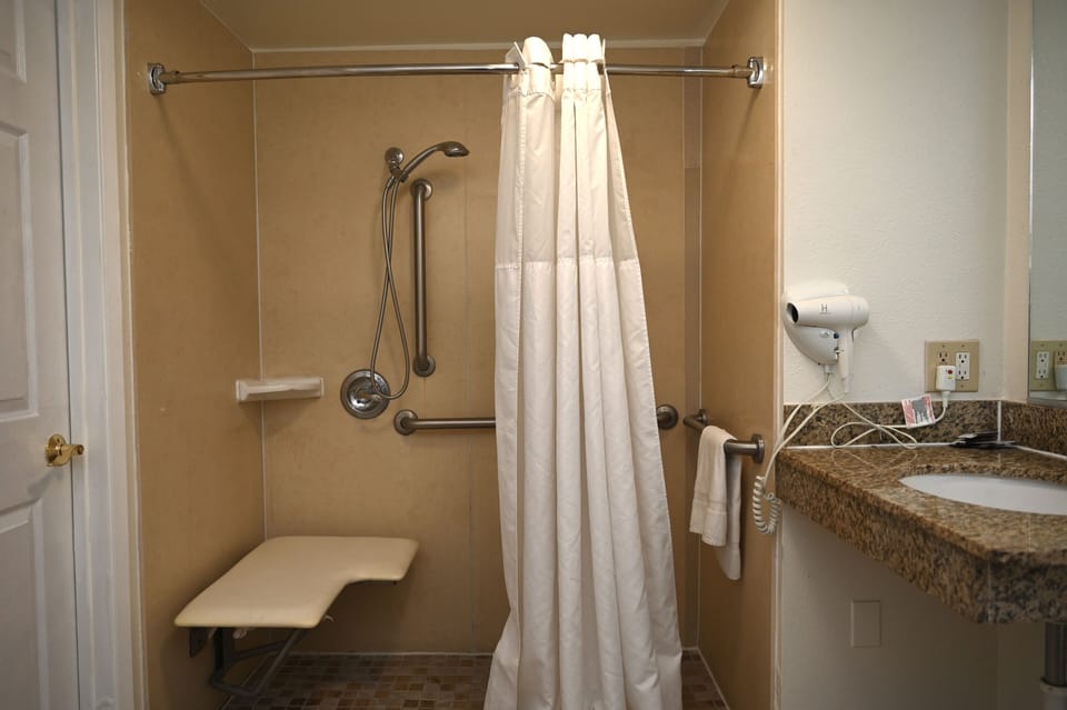 Double Room, 2 Double Beds, Non Smoking | Bathroom | Combined shower/tub, free toiletries, hair dryer, towels