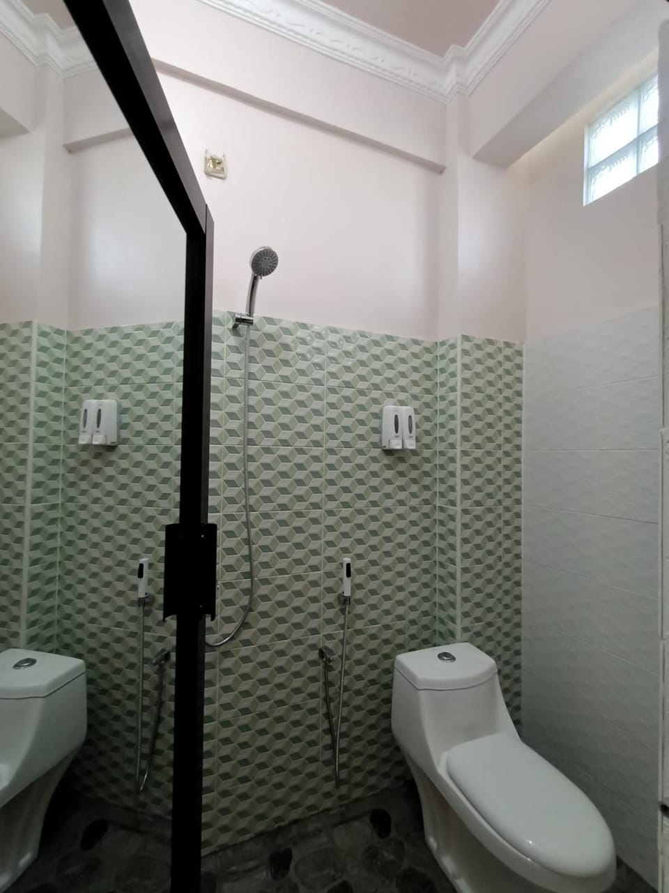 Shower, free toiletries, slippers, towels